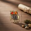 Брошь Сова Точечка: Латунь, Янтарь – Изысканный Аксессуар из России Брошь Сова Точечка: Латунь, Янтарь – Изысканный Аксессуар из России